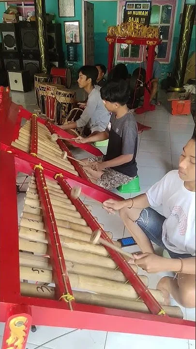 kesenian angklung paglak banyuwangi, angklung paglak, musik - Nilai Filosofis: Harmoni Antara Manusia, Alam, dan Musik