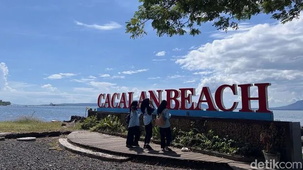 pantai cacalan banyuwangi, pantai cacalan, kano pantai: Wahana Kano Pantai Cacalan: Aktivitas Favorit yang Wajib